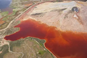 Aerial shot of oxidized iron minerals in water in old mining area, Rio Tinto Aerial shot of oxidized iron minerals in water in old mining area, Rio Tinto