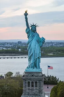 Hudson River Gallery: Aerial of the Statue of Liberty at sunset, New York, USA