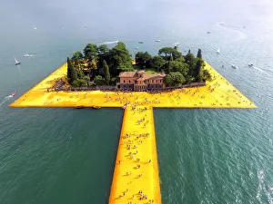 Aerial view of the floating piers in Iseo lake, Brescia province, Lombardy, Italy Aerial view of the floating piers in Iseo lake, Brescia province, Lombardy, Italy