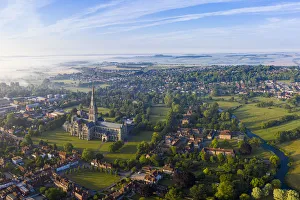 Aerial view over Salisbury and Salisbury Cathedral on a misty summer morning, Salisbury Aerial view over Salisbury and Salisbury Cathedral on a misty summer morning, Salisbury
