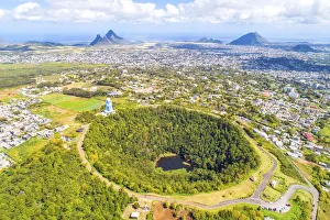 Aerial view of Trou Aux cerfs volcano crater with Curepipe city, Rempart mountain Aerial view of Trou Aux cerfs volcano crater with Curepipe city, Rempart mountain