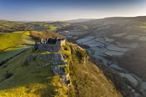 Aerial vista of Carreg Cennen Castle in the Brecon Beacons National Park, Carmarthenshire Aerial vista of Carreg Cennen Castle in the Brecon Beacons National Park, Carmarthenshire