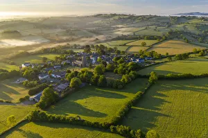 Aerial vista of the Dartmoor village of South Tawton at dawn, Devon, England Aerial vista of the Dartmoor village of South Tawton at dawn, Devon, England