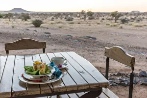 Africa, Namibia, near Keetmanshop. Breakfast with a view Africa, Namibia, near Keetmanshop. Breakfast with a view