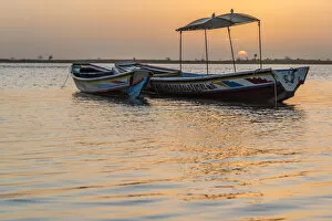 Saloum Delta Collection: Africa, Senegal, Sine-Saloum-Delta. Fishing boats at sunrise