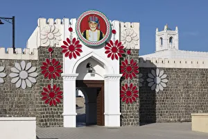 Al Alam Palace decorated with flowers and a picture of Sultan Qaboos, Muscat, Oman Al Alam Palace decorated with flowers and a picture of Sultan Qaboos, Muscat, Oman