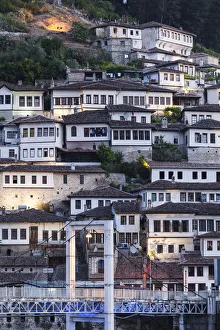 Albania, Berat, Osumi River Pedestrian Bridge and Ottoman-era buildings, dawn Albania, Berat, Osumi River Pedestrian Bridge and Ottoman-era buildings, dawn