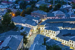 Albania, Gjirokastra, elevated town view from the castle, dusk Albania, Gjirokastra, elevated town view from the castle, dusk