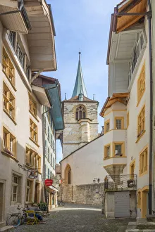 Alley with city church Biel, Canton Biel, Switzerland Alley with city church Biel, Canton Biel, Switzerland