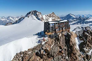The alpine hut of Capanna Regina Margherita in Rosa mount from an aerial view The alpine hut of Capanna Regina Margherita in Rosa mount from an aerial view