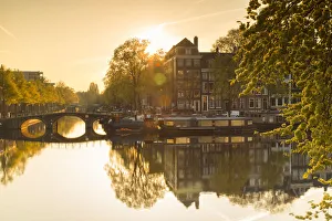 Amstel River at dawn, Amsterdam, Netherlands Amstel River at dawn, Amsterdam, Netherlands