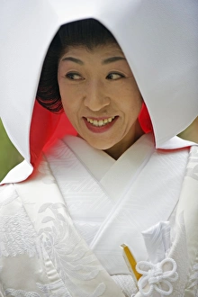 Asia, Japan. Kyoto, Kamigamo Jinja shrine, woman in bridal gown Asia, Japan. Kyoto, Kamigamo Jinja shrine, woman in bridal gown