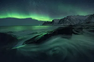 Aurora borealis over Tungeneset and the Okshornan Peaks, Senja Island, Norway Aurora borealis over Tungeneset and the Okshornan Peaks, Senja Island, Norway