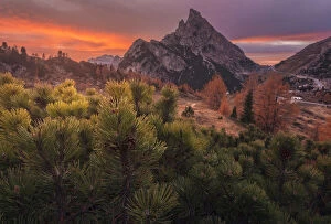 Autumn sunset over the Sass de Stria and the Falzarego Pass in the Dolomites, Italy