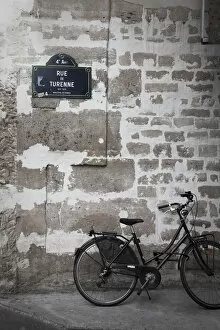 Bicycle and street sign, Paris, France