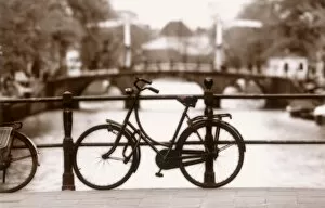 Bicycle Collection: Bike on bridge & Canal, Amsterdam, Holland