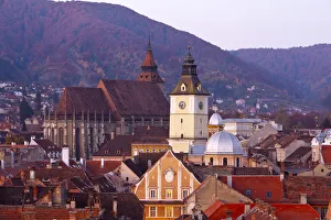 The Black Church & Town Hall Clock Tower illuminated at dawn, Piata Sfatului, Brasov The Black Church & Town Hall Clock Tower illuminated at dawn, Piata Sfatului, Brasov