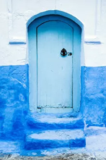 Blue-washed doors and streets of Chefchaouen, Morocco
