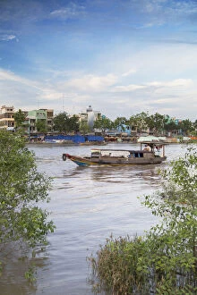 Ben Tre Gallery: Boat passing along Ben Tre River, Ben Tre, Mekong Delta, Vietnam