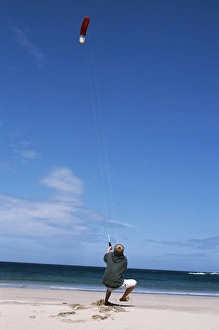A boy flies a kite on one of Colls many A boy flies a kite on one of Colls many