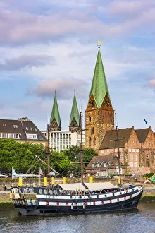 Bremen, Bremen State, Germany. St. Martins Church and Pannekoekschip Admiral Bremen, Bremen State, Germany. St. Martins Church and Pannekoekschip Admiral