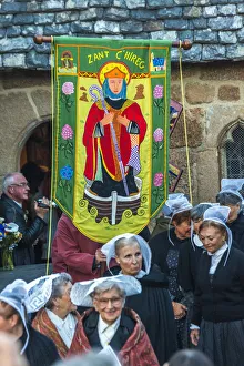 Breton ladies outside church in traditional dress for ceremony of Saint Guirec, Ploumanach Breton ladies outside church in traditional dress for ceremony of Saint Guirec, Ploumanach