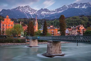 The bridge to Sankt Nikolaus district in Innsbruck at dawn, Tyrol, Austria, Europe The bridge to Sankt Nikolaus district in Innsbruck at dawn, Tyrol, Austria, Europe