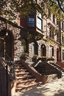 Brownstone buildings in Harlem, Manhattan, New York City, USA Brownstone buildings in Harlem, Manhattan, New York City, USA