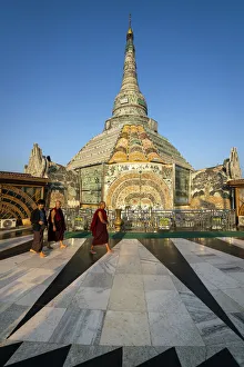Buddhist monks walking by Werawsana Jade Pagoda (AKA Verochana Jade Pagoda Buddhist monks walking by Werawsana Jade Pagoda (AKA Verochana Jade Pagoda