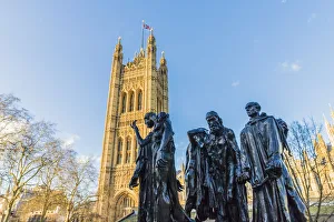 The Burghers of Calais statue by Auguste Rodin, and the Palace of Westminster a UNESCO The Burghers of Calais statue by Auguste Rodin, and the Palace of Westminster a UNESCO