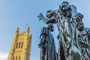 The Burghers of Calais statue by Auguste Rodin, and the Palace of Westminster a UNESCO The Burghers of Calais statue by Auguste Rodin, and the Palace of Westminster a UNESCO