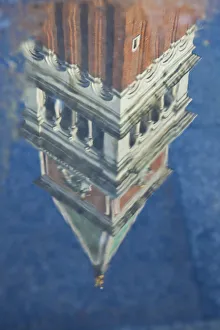 Campanile reflected in puddles in Piazza San Marco (St. Marks Square), Venice, Italy Campanile reflected in puddles in Piazza San Marco (St. Marks Square), Venice, Italy