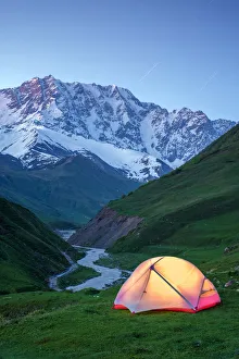 Camping at the head of Enguri gorge in front of Shkhara peak Camping at the head of Enguri gorge in front of Shkhara peak