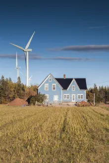 Canada, Prince Edward Island, West Cape, farmhouse and wind turbines Canada, Prince Edward Island, West Cape, farmhouse and wind turbines