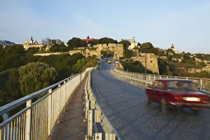 Car crossing bridge to Old Town, Kamyanets-Podilsky, Podillya, Ukraine Car crossing bridge to Old Town, Kamyanets-Podilsky, Podillya, Ukraine