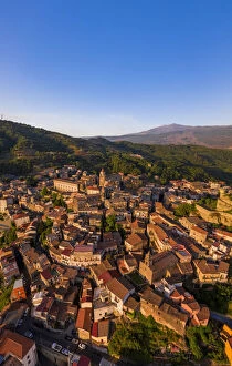 Castiglione di Sicilia, Sicily. Aerial view of the village with the Etna volcano in the