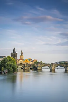 Charles Bridge and Old Town Bridge Tower against sky at sunset, Prague, Bohemia Charles Bridge and Old Town Bridge Tower against sky at sunset, Prague, Bohemia