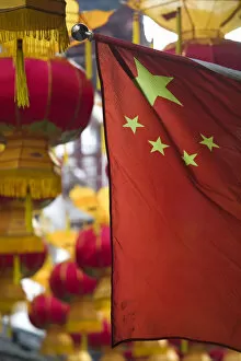 China, Shanghai, Old Town, Yuyuan Gardens and Bazaar, Chinese Flag and Festive Lanterns