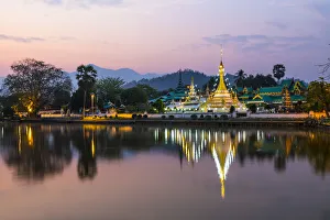 Chong Kham lake and Wat Chong Kham temple in the background at sunrise, Mae Hong Son Chong Kham lake and Wat Chong Kham temple in the background at sunrise, Mae Hong Son