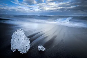 Sudurland Region Gallery: Chunks of ice on shore at Diamond beach near Jokulsarlon glacier lagoon, South Iceland