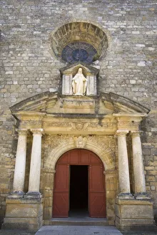 Church doorway, Domme, Dordogne, Aquitaine, France Church doorway, Domme, Dordogne, Aquitaine, France