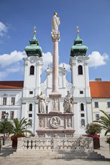 Church of St Ignatius Loyola and Trinity Column in Szechenyi Square, Gyor, Western Church of St Ignatius Loyola and Trinity Column in Szechenyi Square, Gyor, Western