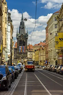 City centers street with tram and Henrys Tower in the background City centers street with tram and Henrys Tower in the background