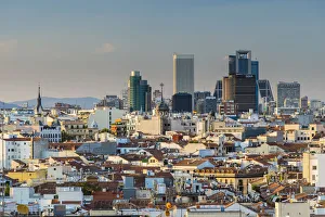 City skyline at sunset with modern financial center behind, Madrid, Comunidad de Madrid City skyline at sunset with modern financial center behind, Madrid, Comunidad de Madrid