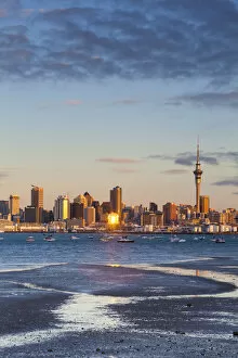 Sky Tower Gallery: City skyline & Waitemata Harbour illuminated at sunset, Auckland, North Island, New