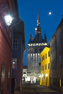 Clock Tower illuminated at dusk, Sighisoara, Transylvania, Romania Clock Tower illuminated at dusk, Sighisoara, Transylvania, Romania