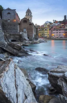 Cloudy dawn in the harbour of the village of Vernazza, Cinque Terre national park Cloudy dawn in the harbour of the village of Vernazza, Cinque Terre national park