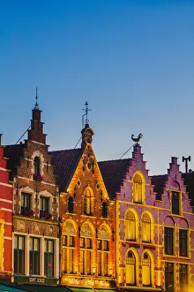Detail of the colored houses facades in Markt Square in Bruges by night, Belgium Detail of the colored houses facades in Markt Square in Bruges by night, Belgium