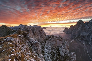 Colorful sunrise over the ridges of the Pale of the Balconies, Pala group, Dolomites, Italy Colorful sunrise over the ridges of the Pale of the Balconies, Pala group, Dolomites, Italy