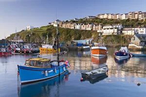 Images Dated 18th May 2016: Cornish fishing boats in Mevagissey harbour at sunrise, Cornwall, England. Spring